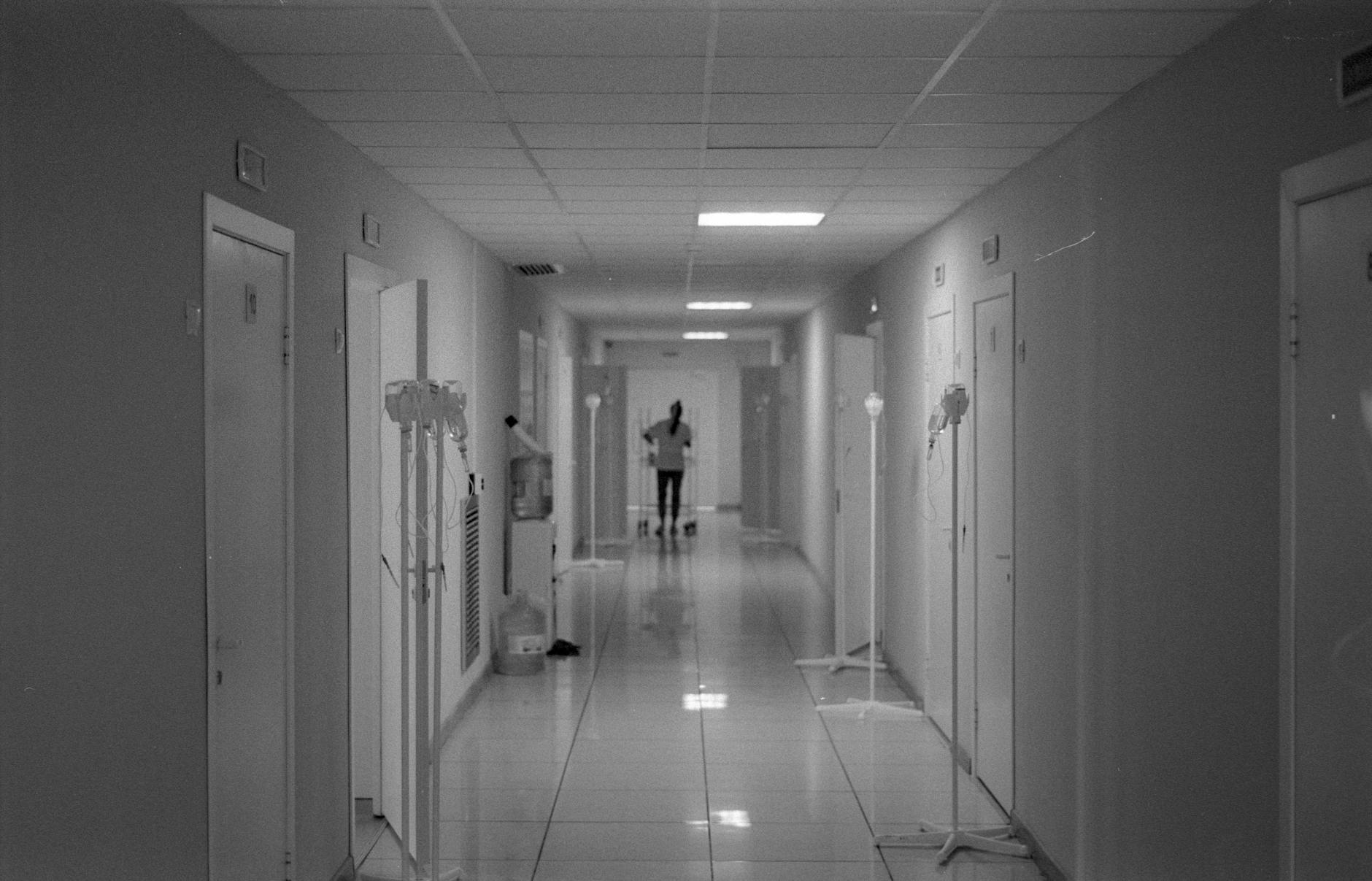 Hospital corridor — pharaoh ants exploit linear infrastructure in healthcare facilities to move between patient rooms, supply storage, and dietary services