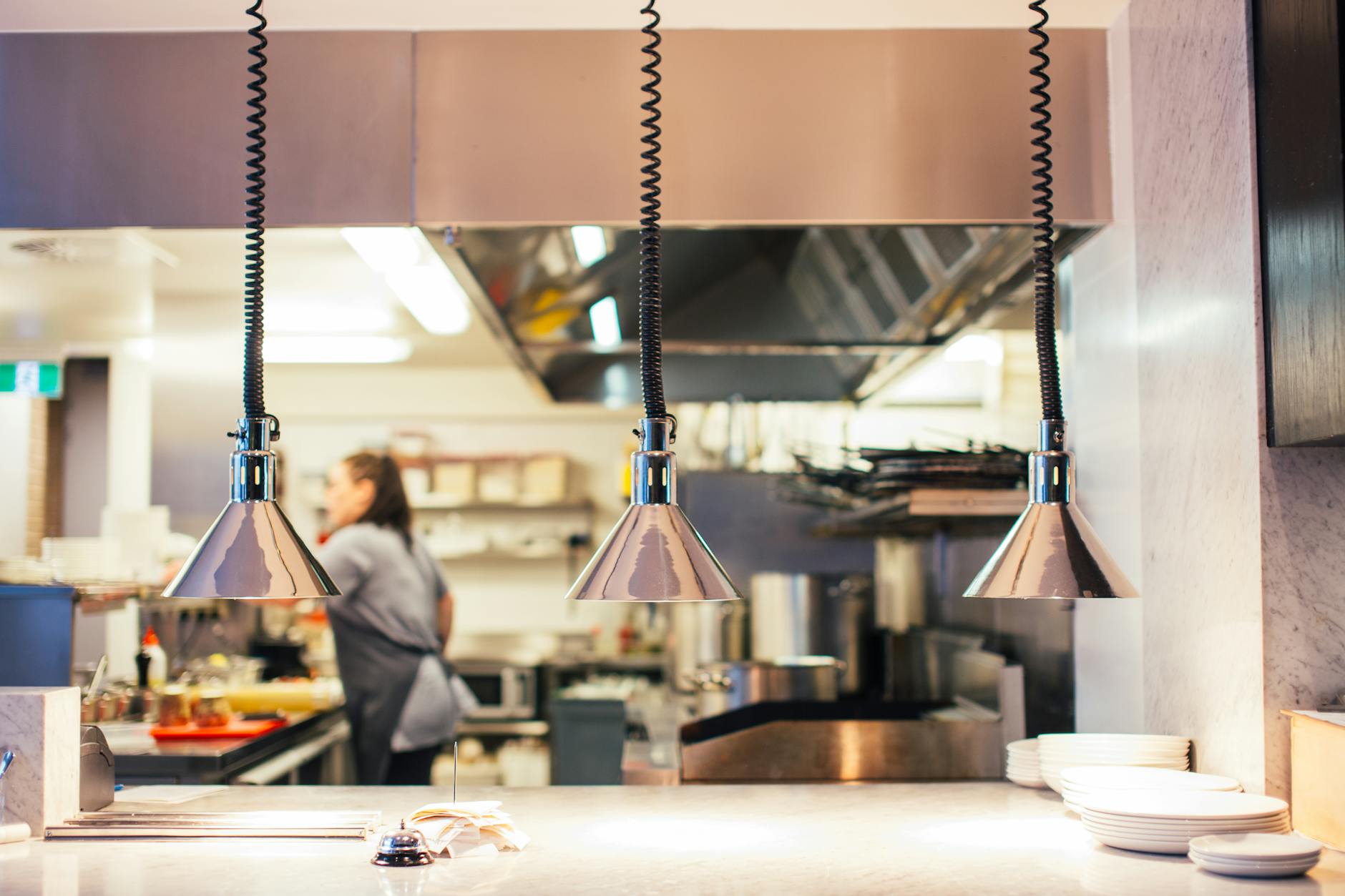Warm motor compartments on under-counter refrigeration and dish equipment are prime German cockroach harborage sites in commercial kitchens