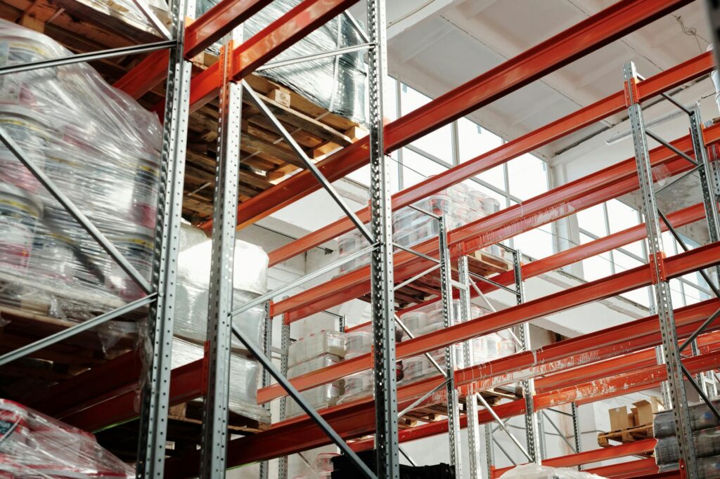 Indianapolis warehouse interior with palletized inventory — primary harborage and food-source environment for rodent populations in distribution centers